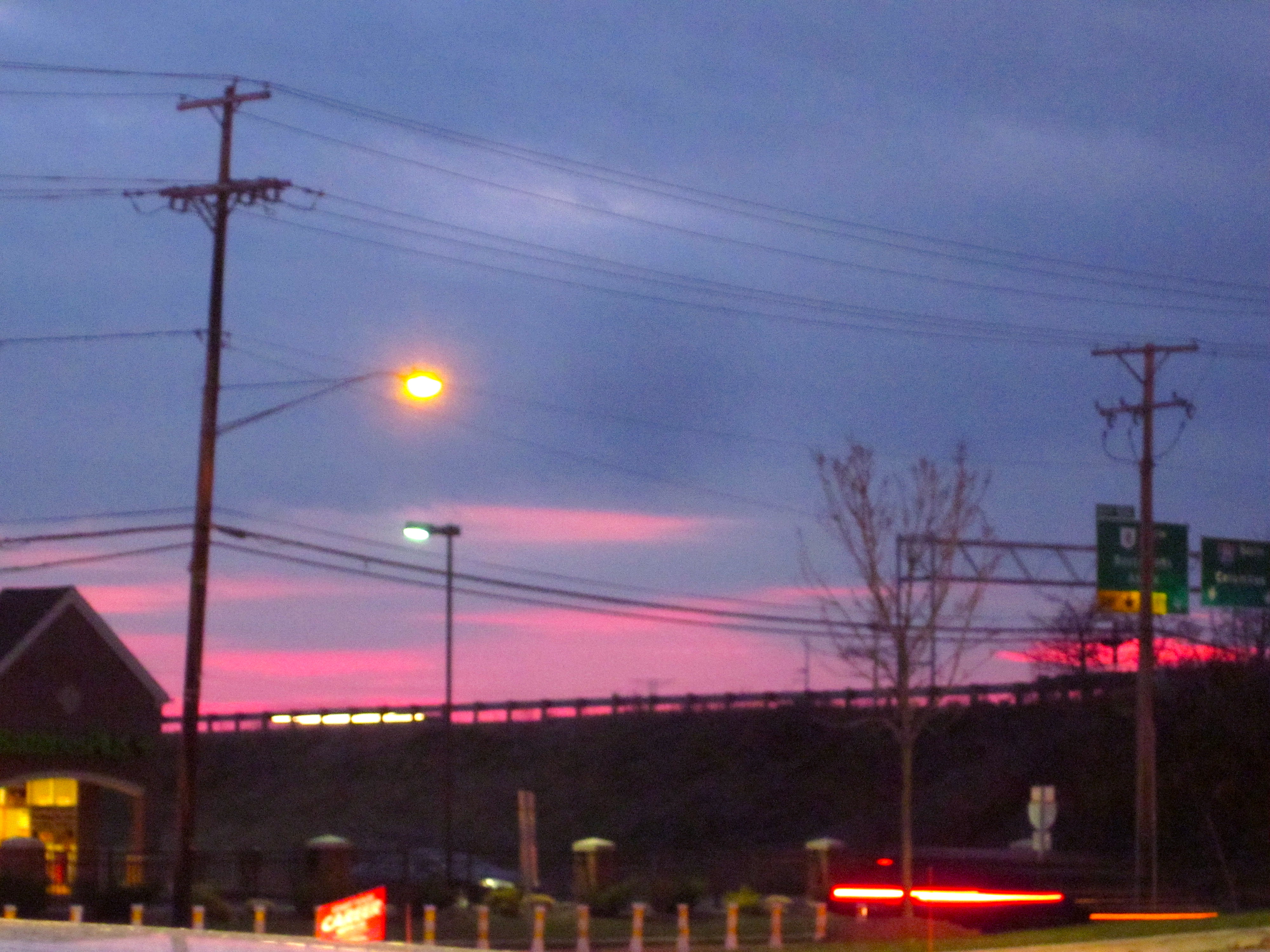 Grey-blue clouds above pink sunset